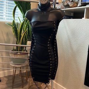 Size Medium black club dress. Brand new